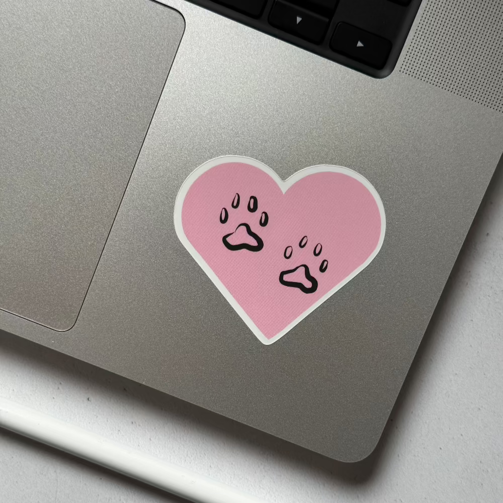 cat paws in a pink heart vinyl sticker
