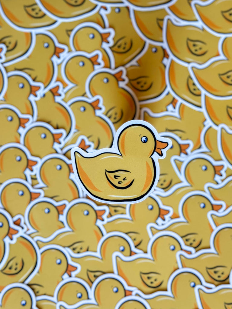 Group of yellow rubber duck vinyl stickers, perfect for personalising water bottles, laptops, and more