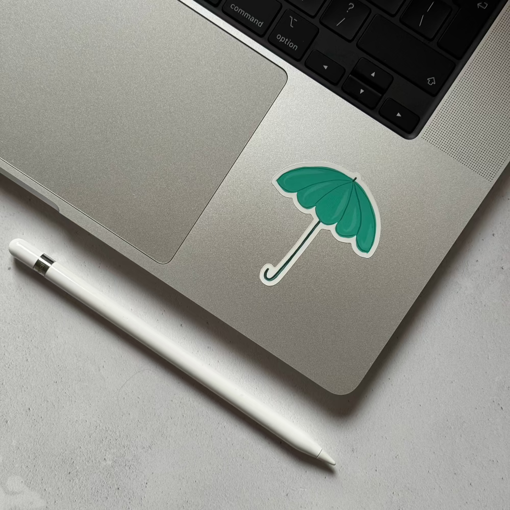 Teal umbrella sticker featuring a whimsical design, ideal for adding charm to water bottles, laptops, and more